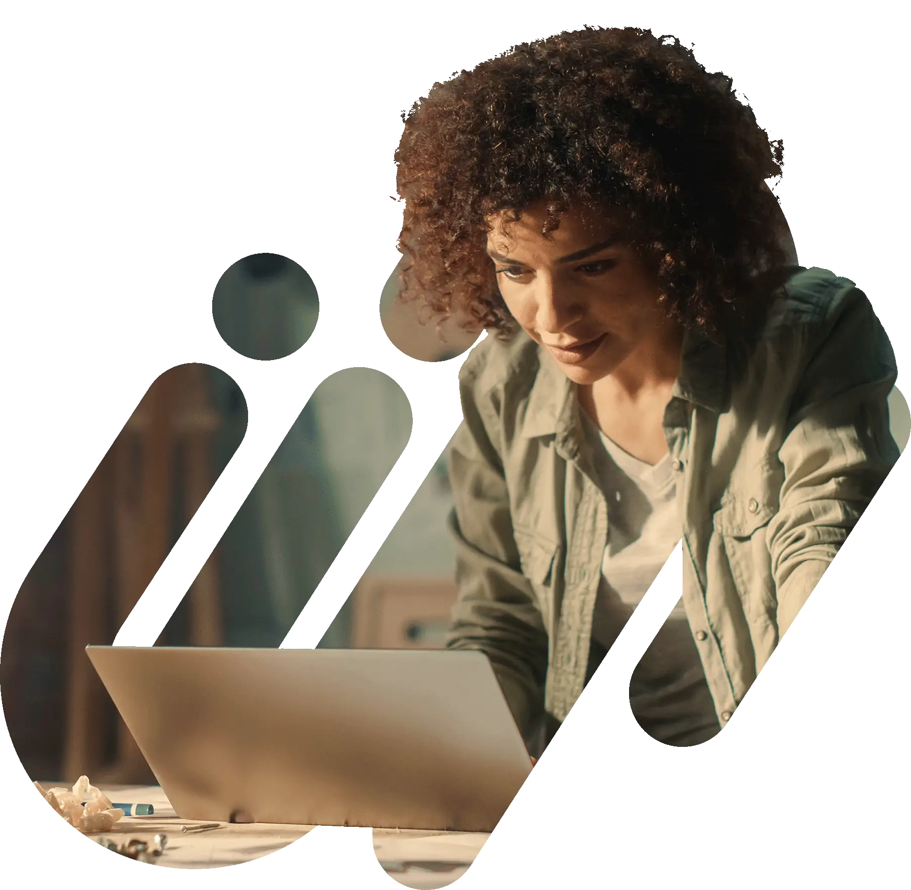 Woman looking at laptop on Workshop Desk