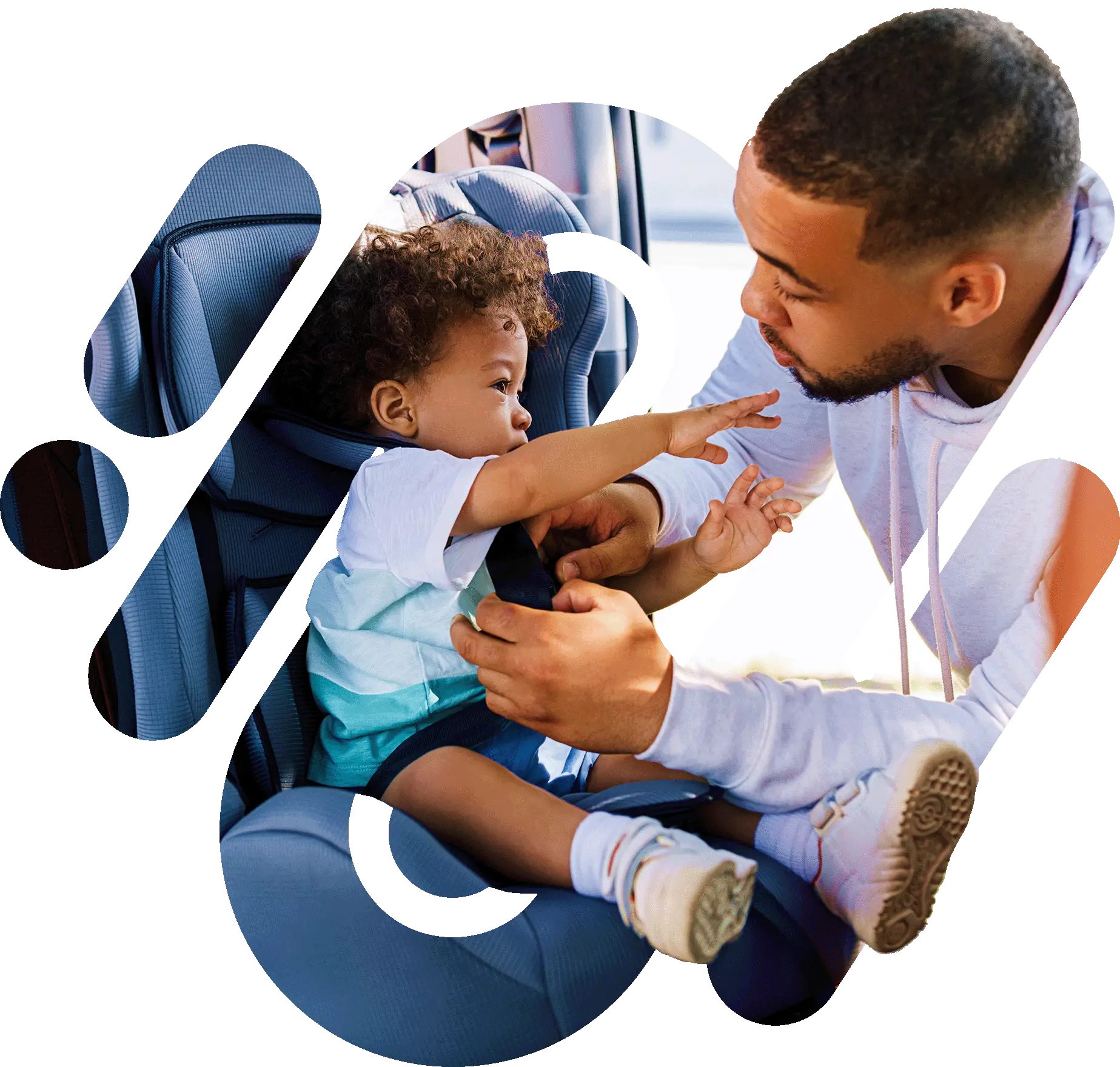 Man getting baby out of car seat