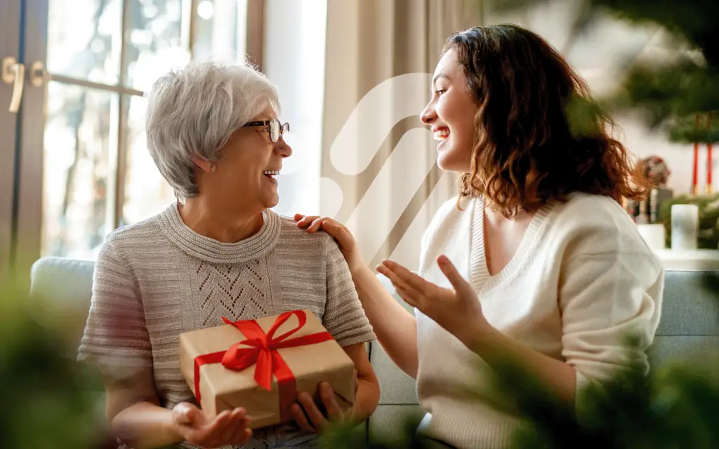 Women giving a Christmas gift