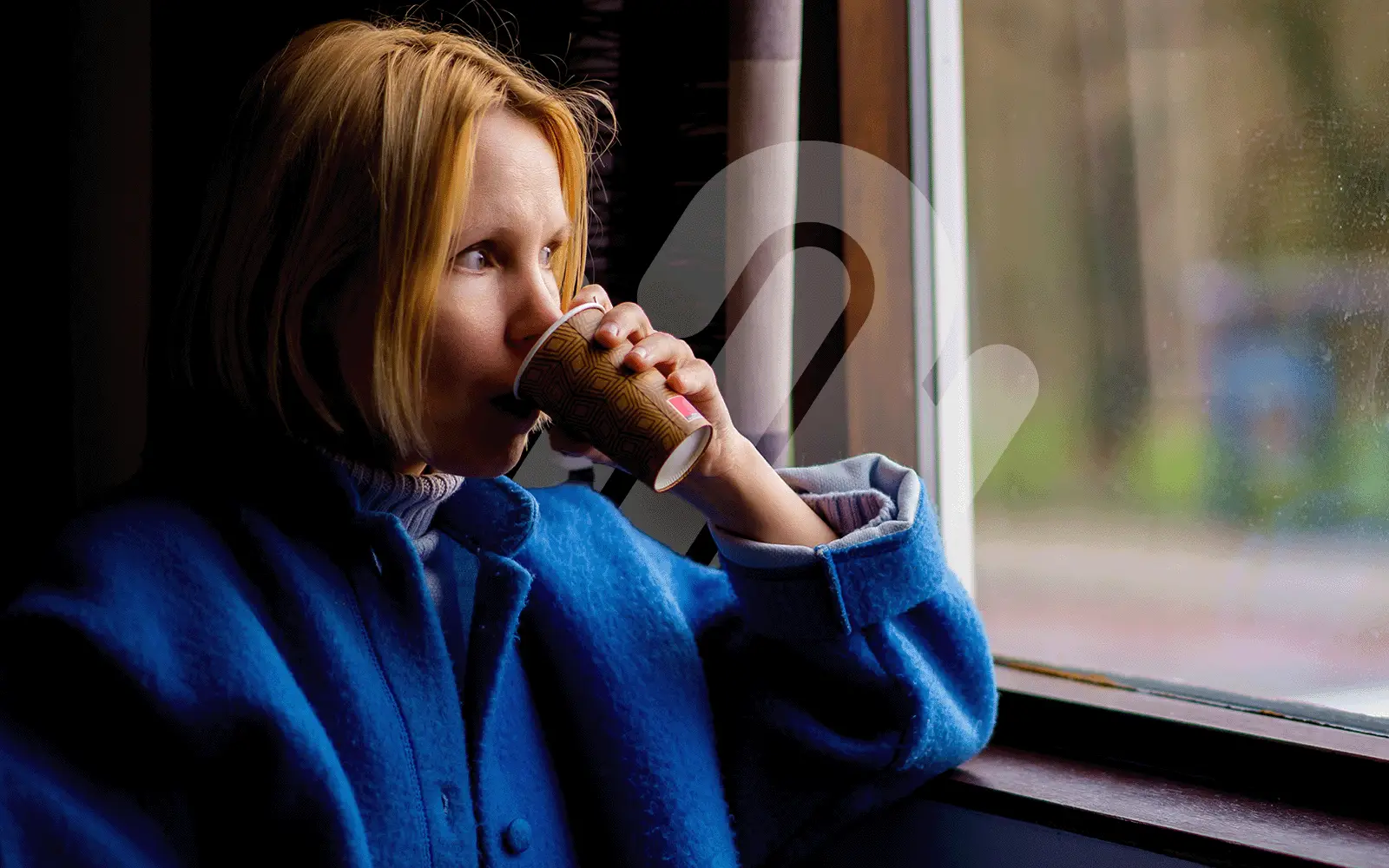 Woman during Coffee looking out the Window